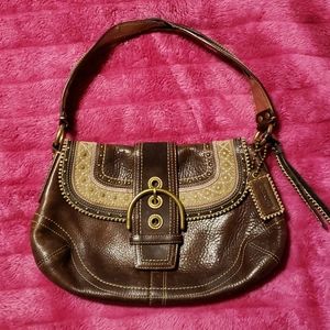 Coach shoulder bag with brass hardware